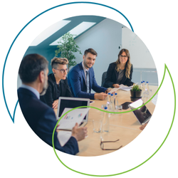 A group of people sitting around a table