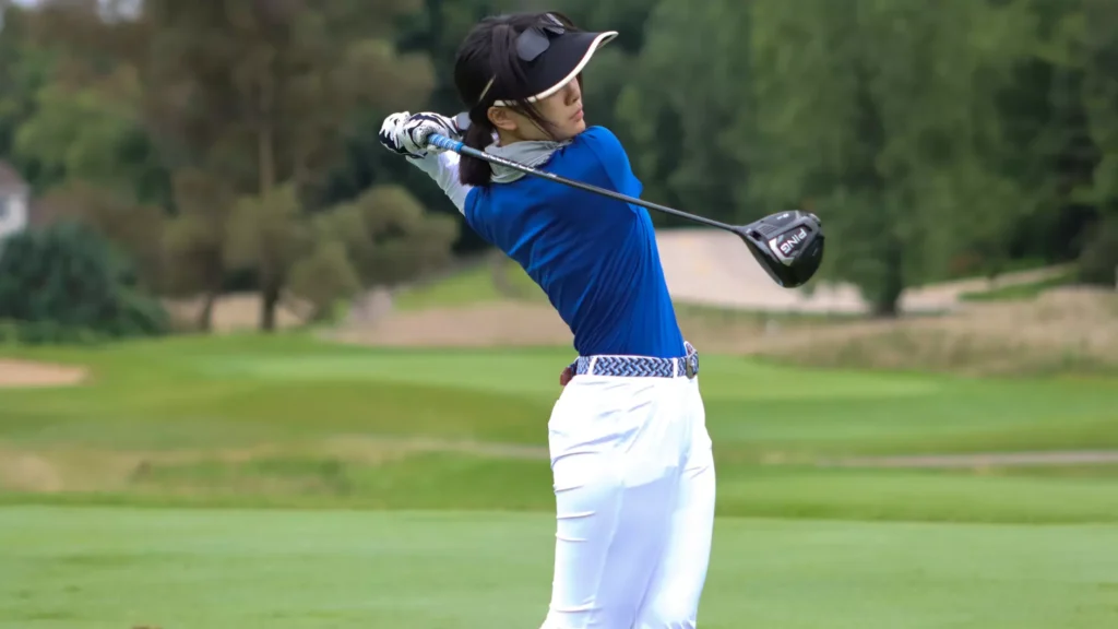 Women playing college golf