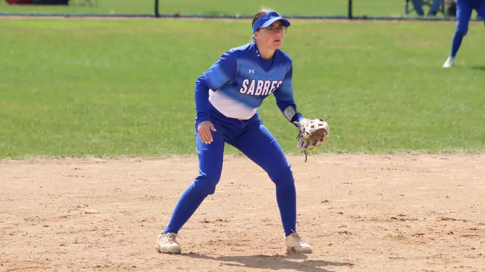 women playing college softball