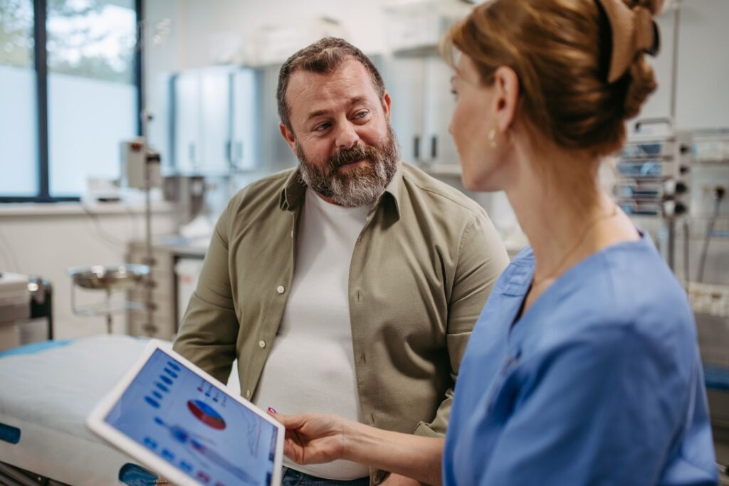 A man talking to a doctor