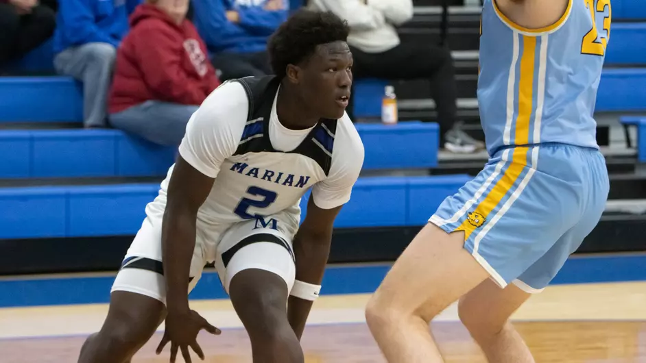 Men playing college basketball