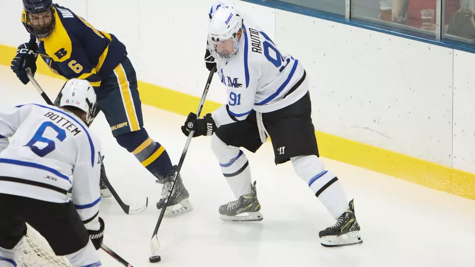 Men playing college hockey