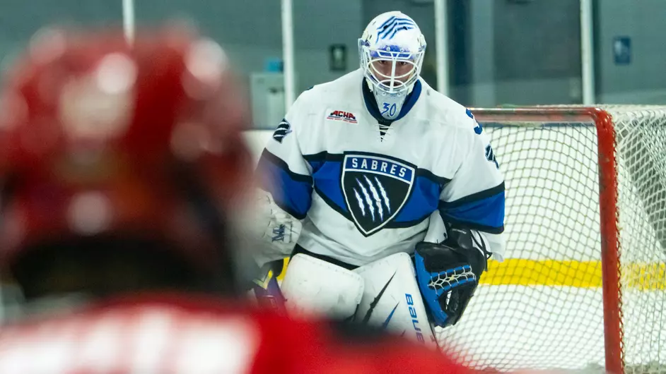 men playing college hockey