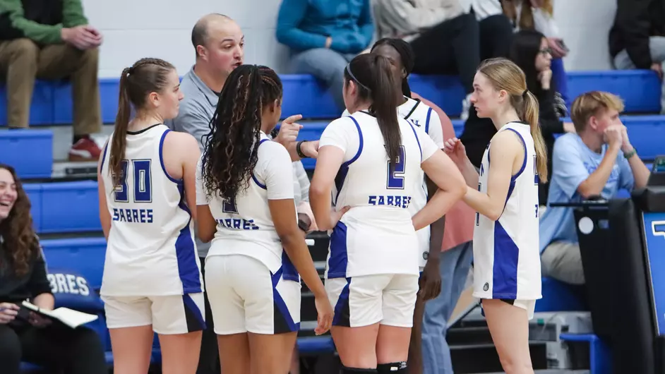 Women playing college basketball