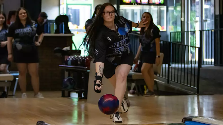 Women playing bowling for their college