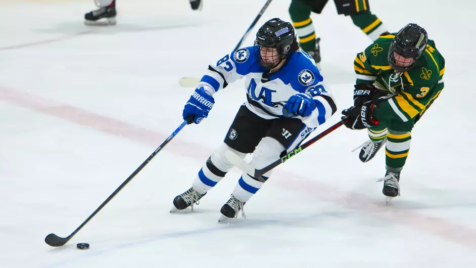 women playing college hockey