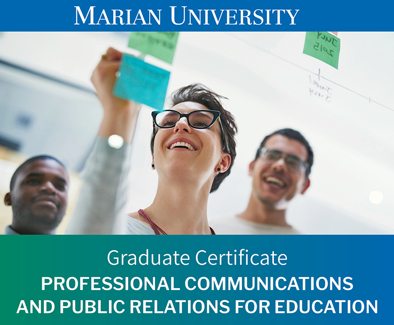 Three people looking at a board writing