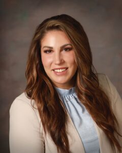 A smiling young woman