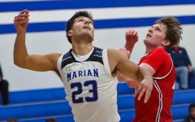 Lindert lights it up as Sabre men’s basketball rolls to victory