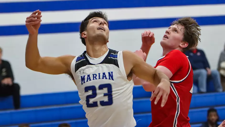 Men playing college basketball
