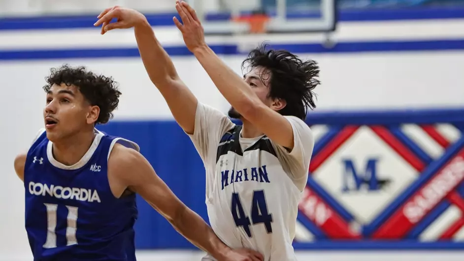 Men playing college basketball