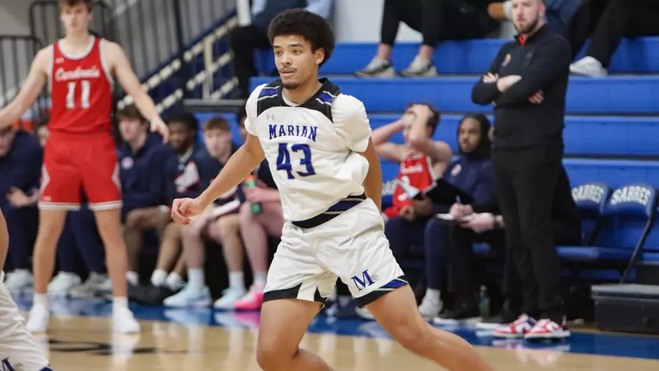 Men playing college basketball