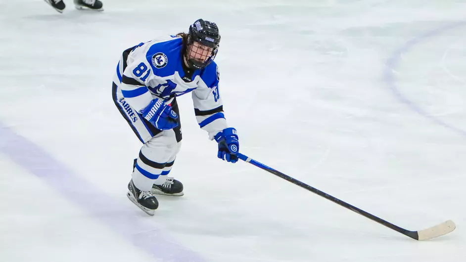 Women playing college hockey
