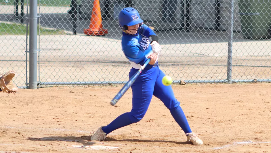 Women playing college softball