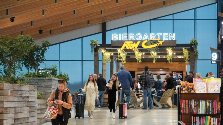 People near an airport bar