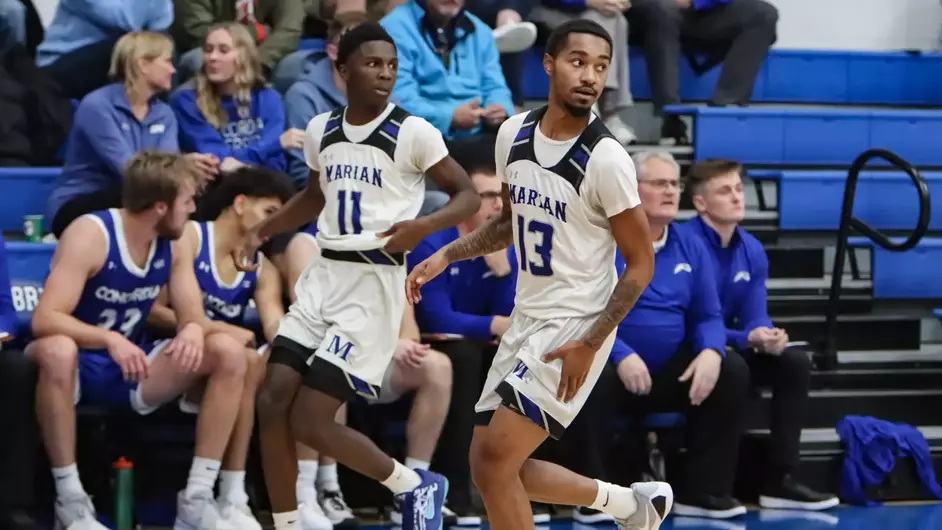 Men playing college basketball