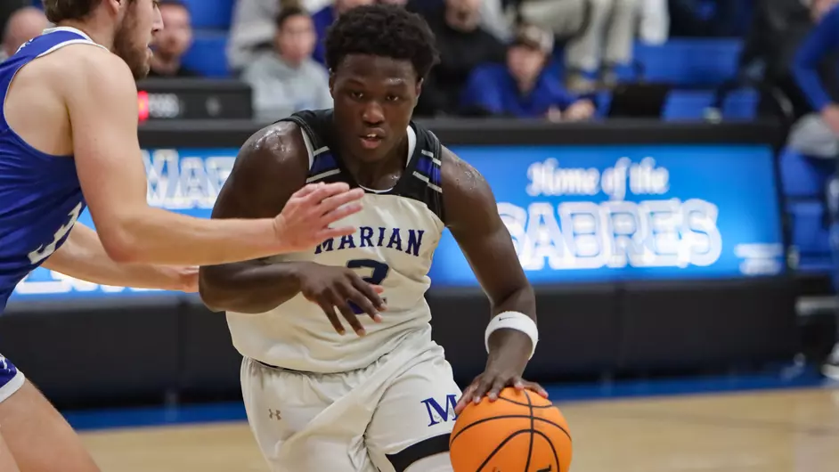 Men playing college basketball