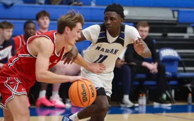 Marian men’s basketball cruises past Maranatha Baptist
