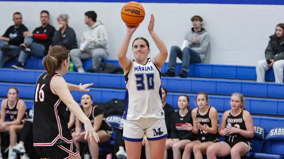 Women playing college basketball