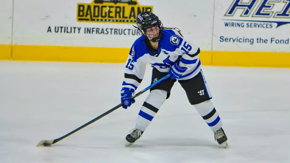 Women playing college hockey