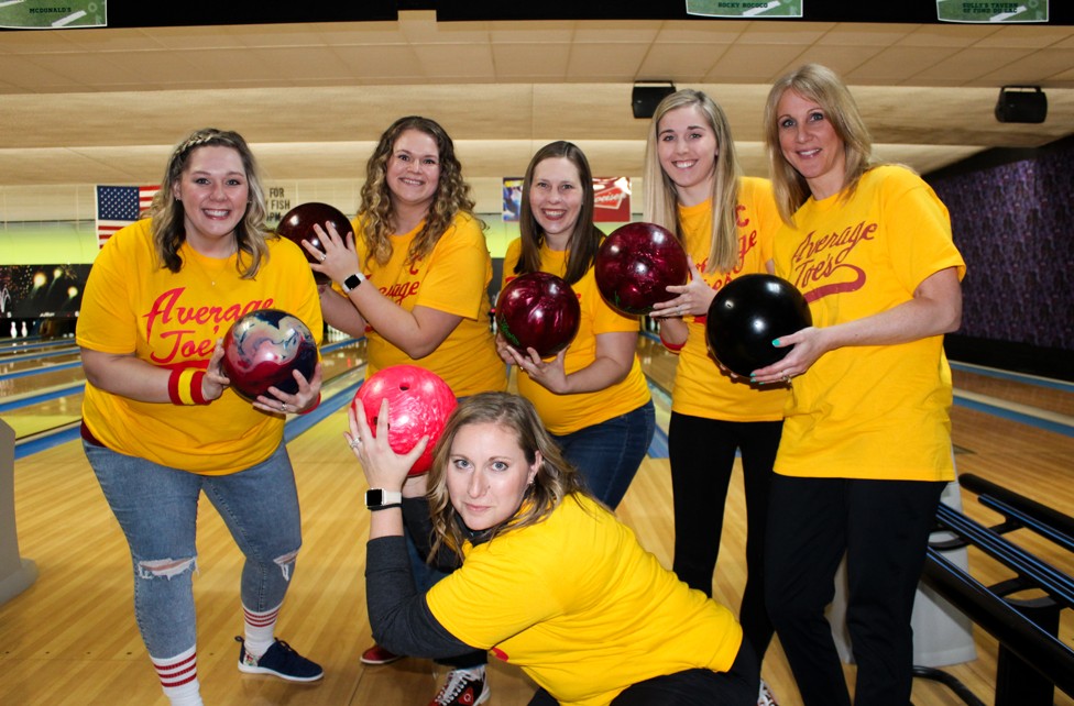 A group of women bowling