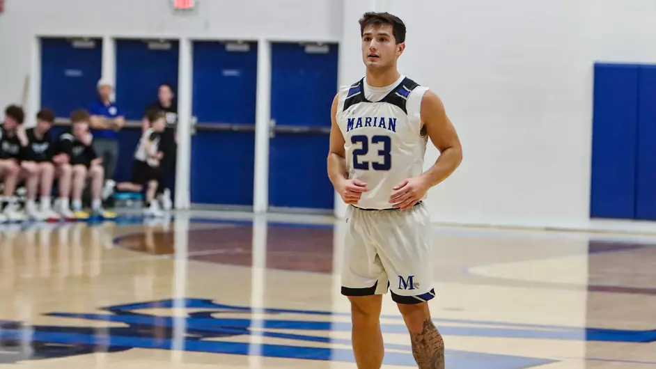Men playing college basketball