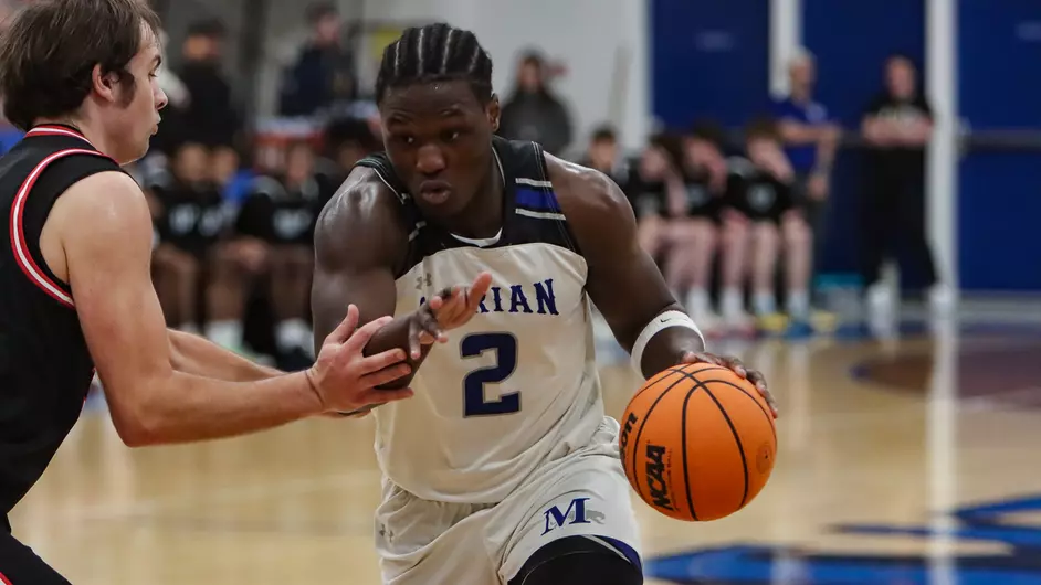 Men playing college basketball