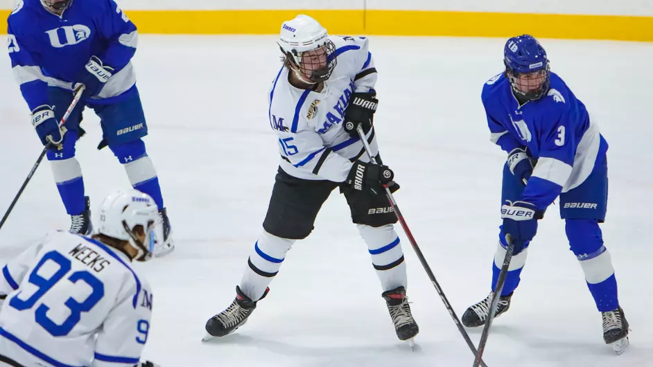 Men playing college hockey