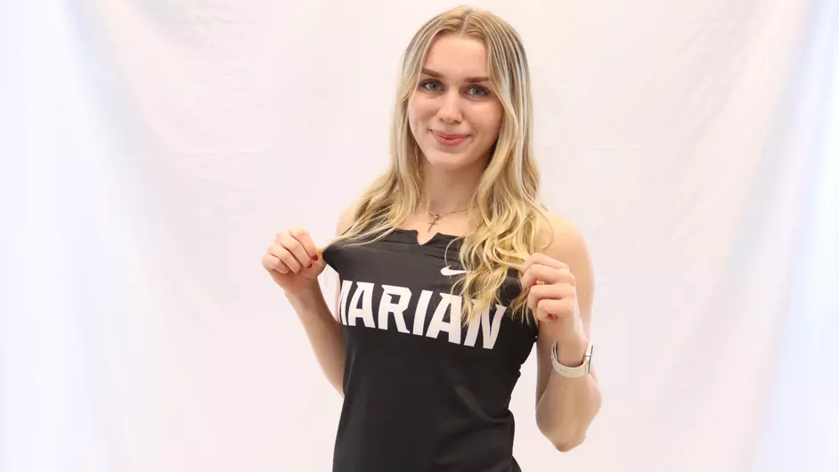 A woman wearing a Marian tank top