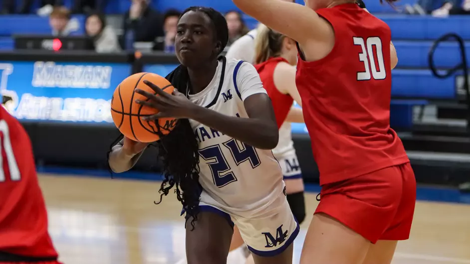 women playing college basketball