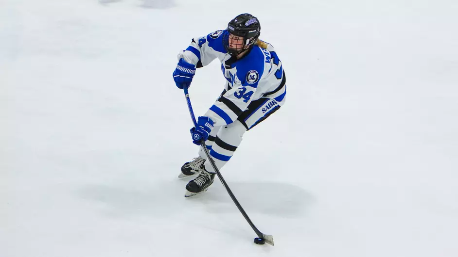 Women playing college hockey