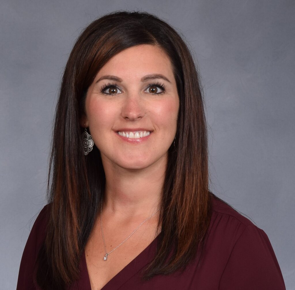 A smiling young woman