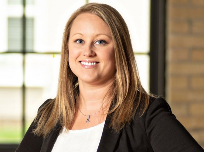 A smiling young woman