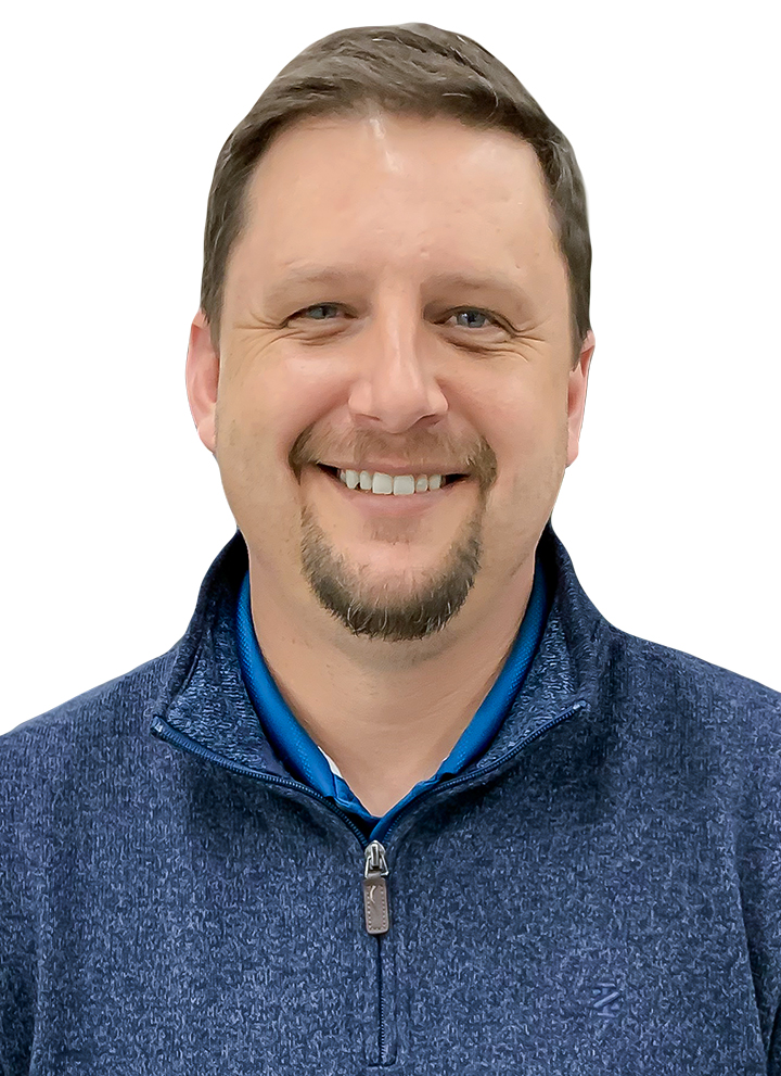 A smiling middle aged man