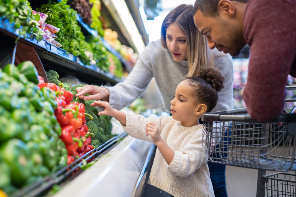 a family picking out vegatables