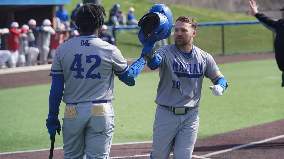 Men playing college baseball