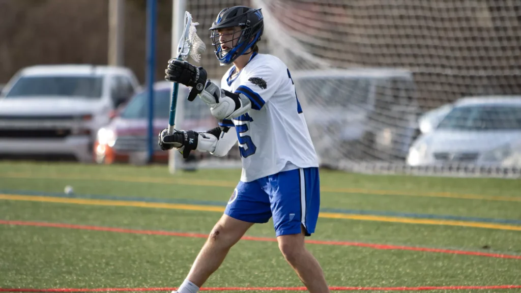 Men playing college lacrosse