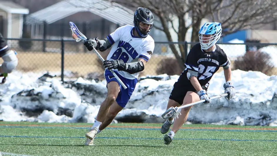 Men playing college lacrosse