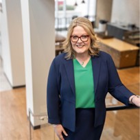 A smiling young woman