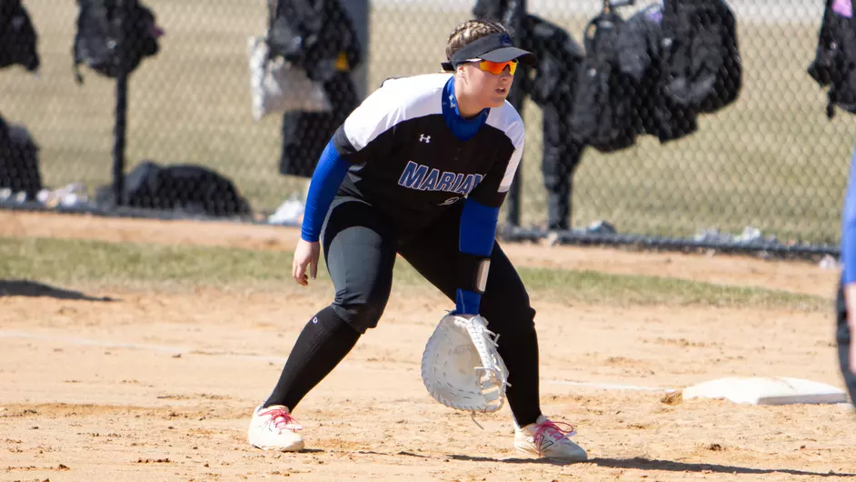 women playing college softball