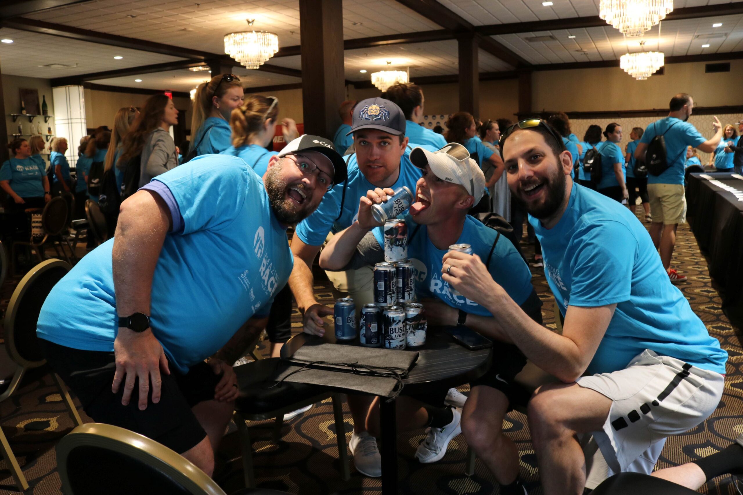 A group of men creating a can tower