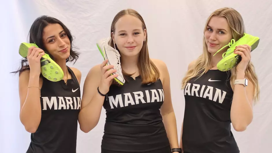 Three college track athletes