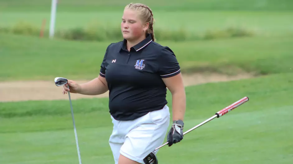 Women playing college golf