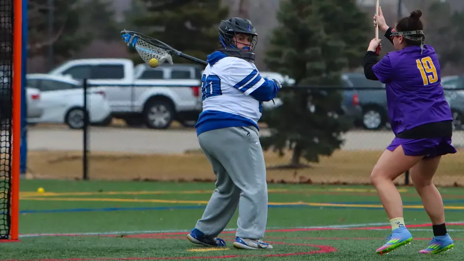 Women playing college lacrosse