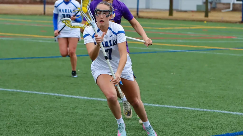 Women playing college lacrosse