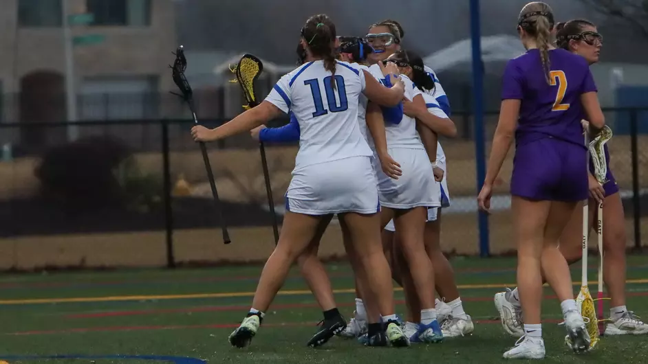 Women playing college lacrosse