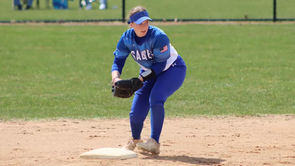 Women playing college softball