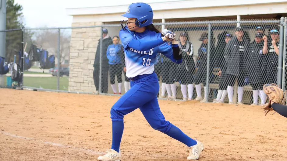 Women playing college softball