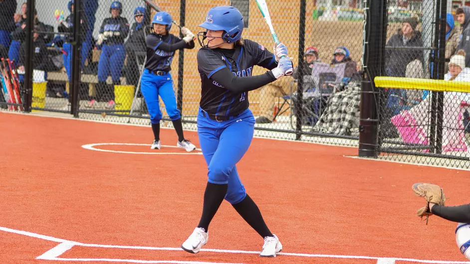 Women playing college softball