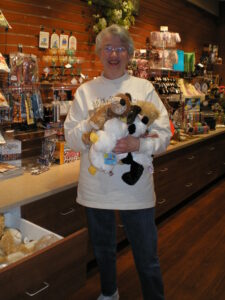 An older woman working in a gift shop